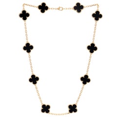 Van Cleef & Arpels Vintage Alhambra Halskette mit 10 Onyx-Motiven aus Gelbgold, Nachlass