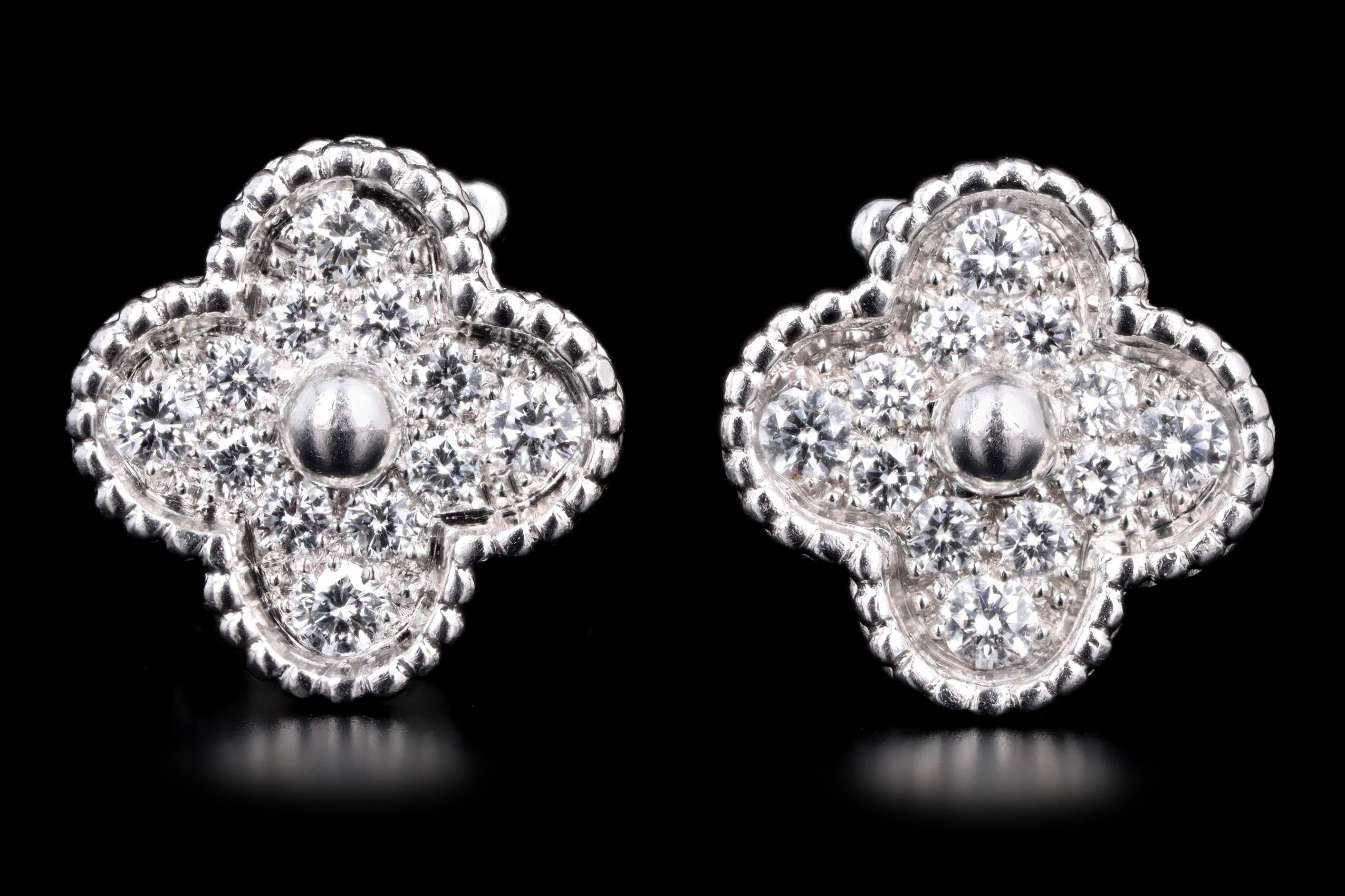 Designer: Van Cleef & Arpels

Composition: 18K White Gold

Primary Stone: Twenty Four Round Brilliant Cut Diamonds

Total Carat Weight: Approximately 1.0 Carats 

Color/Clarity: D-F / VVS1-2

Earring Dimensions:  0.6'' Length / 0.6'' Width

Earring