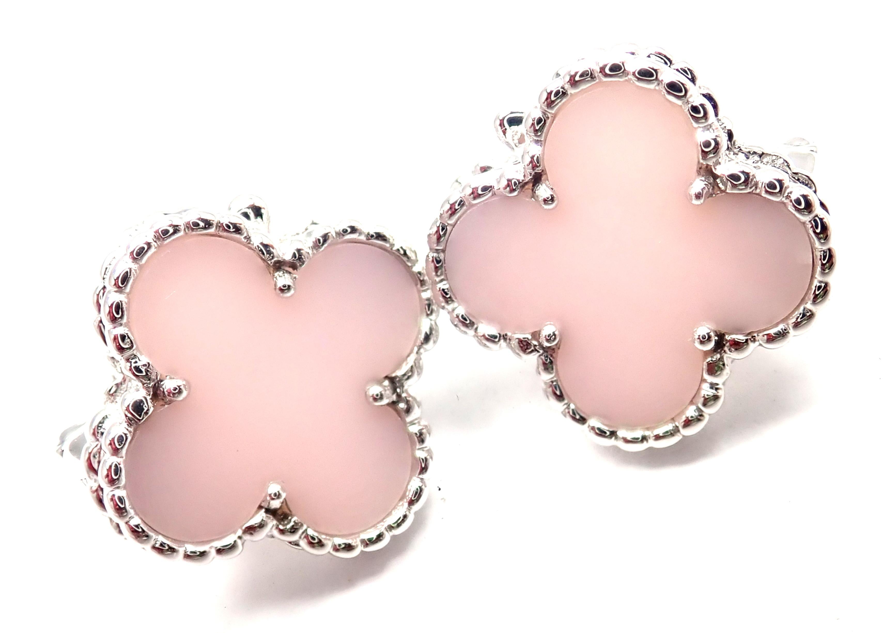 18k White Gold Vintage Alhambra Pink Opal Earrings by Van Cleef & Arpels. 
With 2 pink opal stones: 15mm each. 
These earrings are for pierced ears. 
Details: 
Measurements: 15mm x 15mm 
Alhambra: 15mm 
Weight: 7.6 grams
Stamped Hallmarks: VCA 750