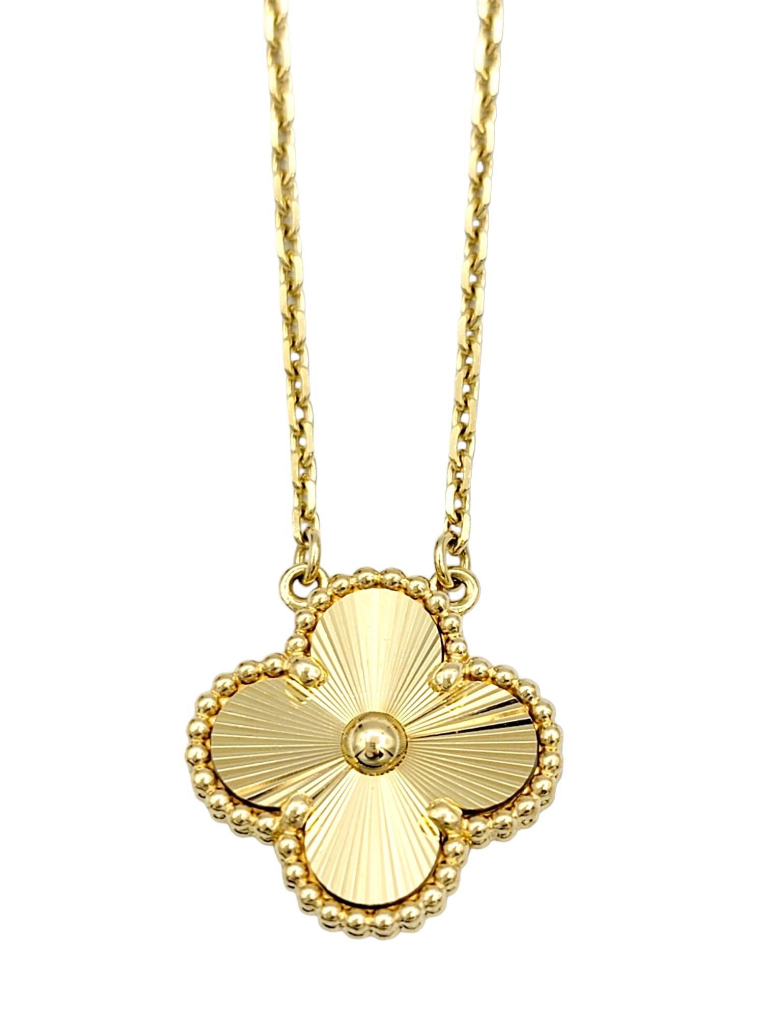 Van Cleef & Arpels' Vintage Alhambra pendant is a true embodiment of timeless elegance and meticulous craftsmanship. Crafted in 18 karat yellow gold, the pendant takes the form of the iconic four-leaf clover, synonymous with luck and charm. The