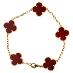 Van Cleef & Arpels Bracelet vintage Alhambra en or jaune à 5 motifs en cornaline rouge