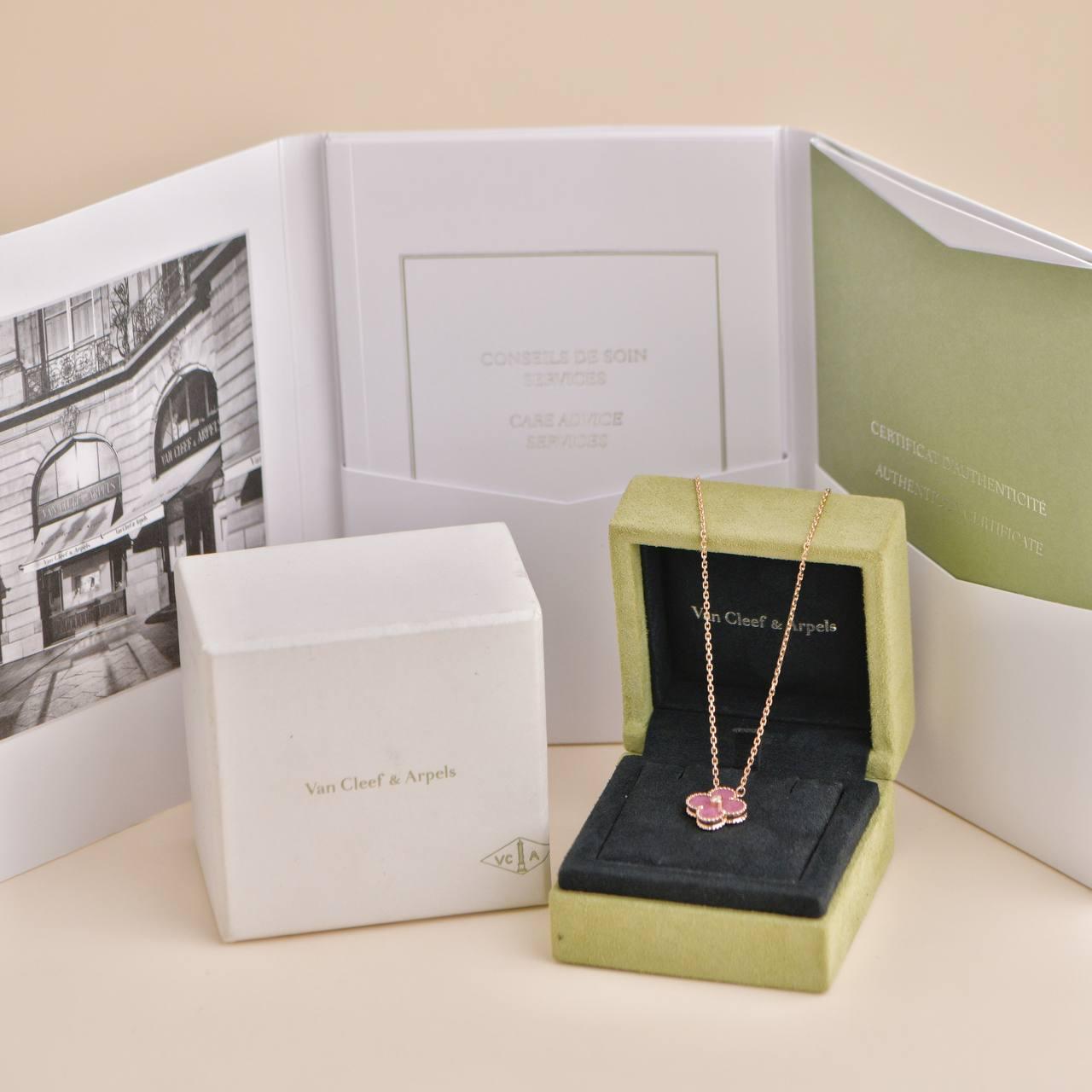 *Rare Find*

Released as part of the exclusive 2021 Holiday collection, this pendant features a captivating rhodonite clover motif measuring approximately 1.5cm set in 18k rose gold. The delicate design is adorned with a single, brilliant-cut 0.05ct