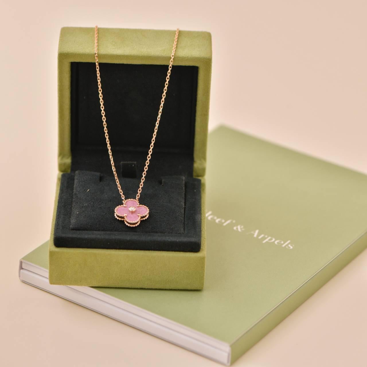 **Rare Find**

This preloved Van Cleef & Arpels Vintage Alhambra Rhodonite Diamond 2021 Holiday Pendant comes as a full set with VCA box and VCA Certificate of Authenticity. Weighing approximately 6.10 grams, total length of approximately 42cm and