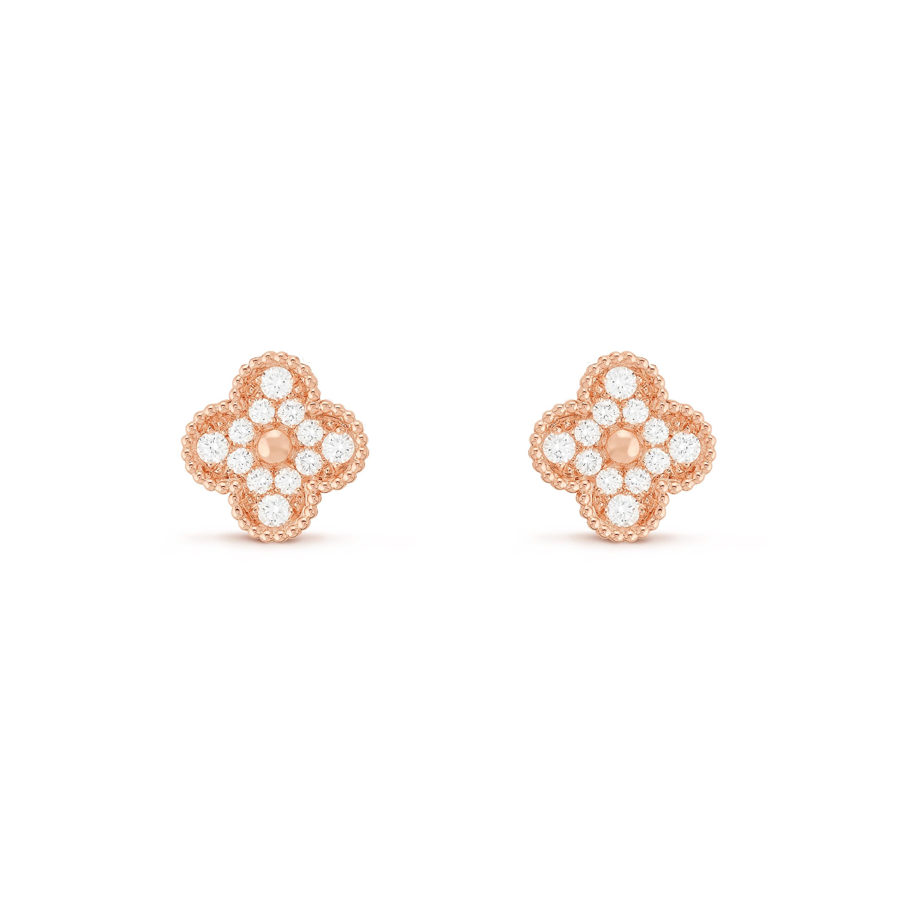 This classic vintage Van Cleef & Arpels earrings are  crafted in 18k rose gold and feature 2lucky clover motifs inlaid withmalachite in round bead settings. Made in France circa 2000 Measurements: 0.59