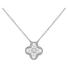 Van Cleef & Arpels, collier pendentif Alhambra vintage en or 18 carats avec diamants ronds