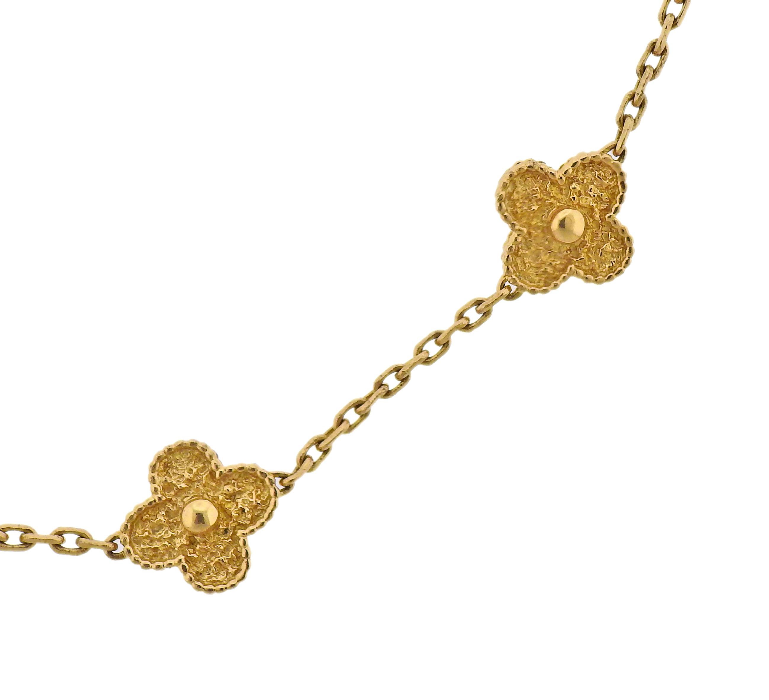 Iconic Vintage Alhambra 10 clover motif necklace by Van Cleef & Arpels, in 18k yellow gold. Necklace is 16.5