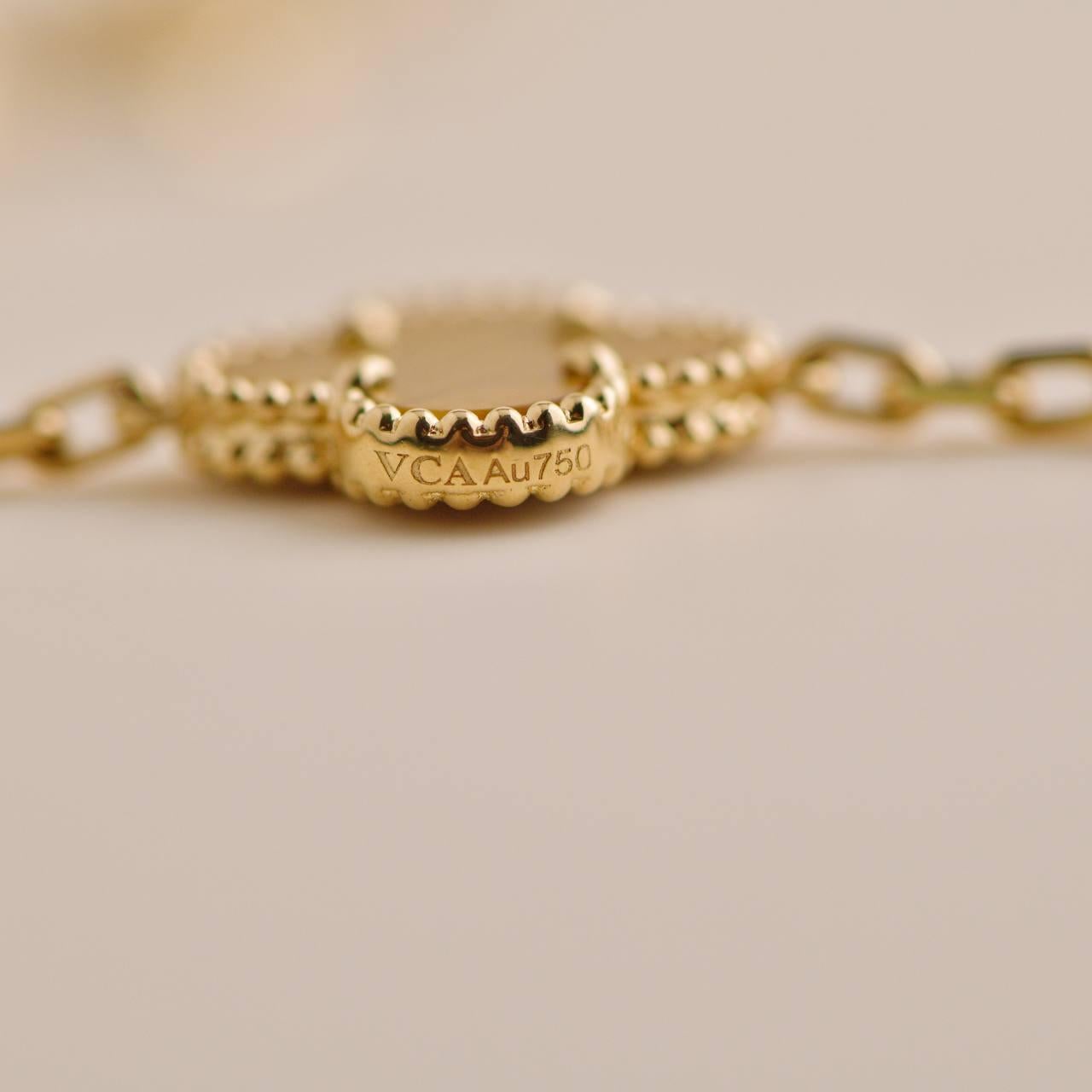 Women's or Men's Van Cleef & Arpels Vintage Alhambra Tiger Eye Yellow Gold 20 Motifs Necklace