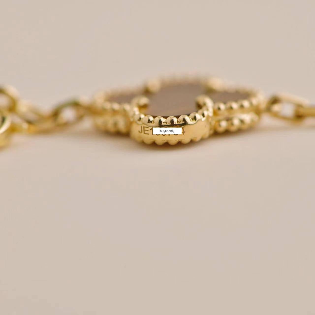 Van Cleef & Arpels Vintage Alhambra Tiger Eye Yellow Gold 20 Motifs Necklace 1