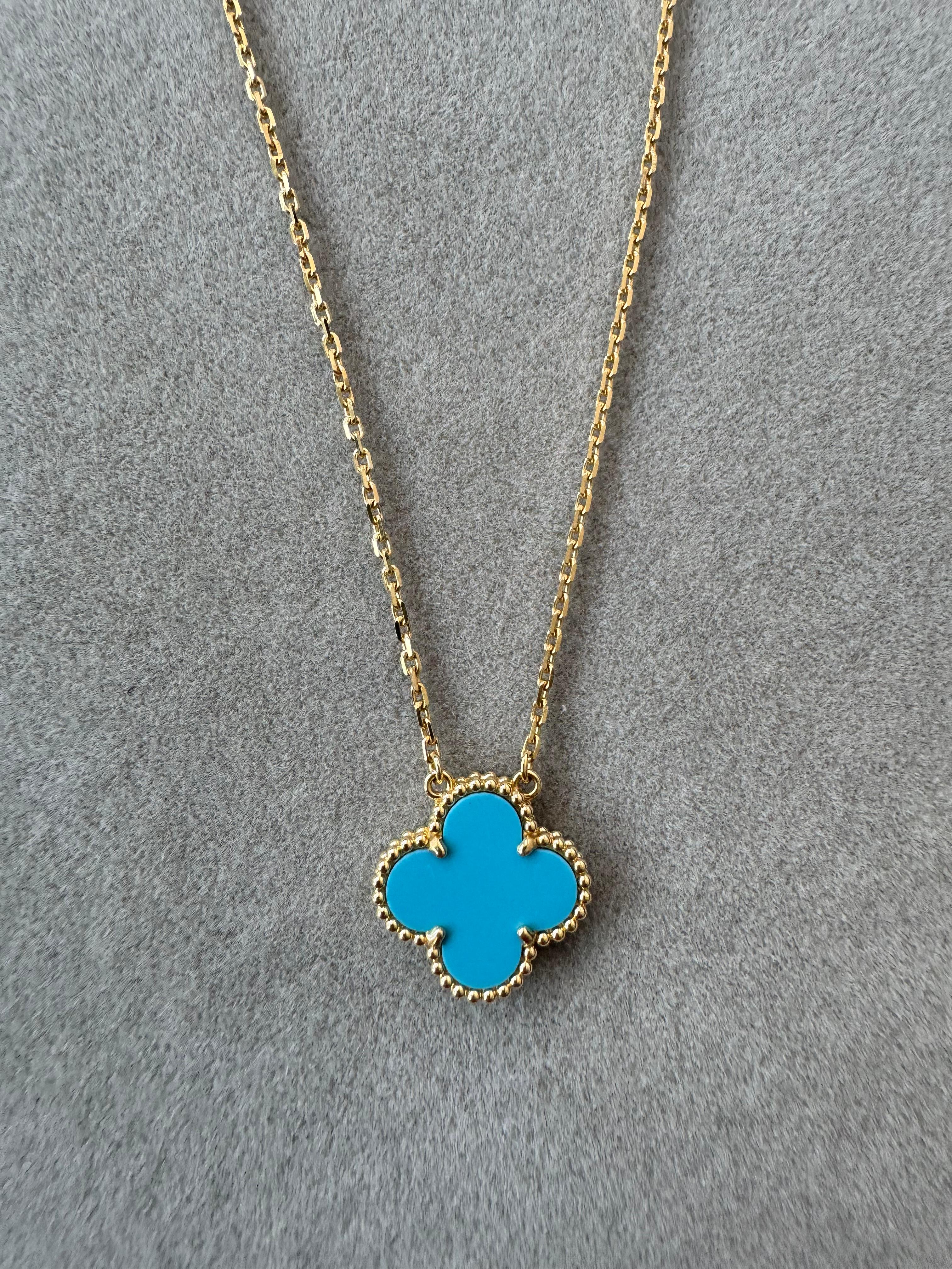 18K Yellow Gold AU 750 
4.96 Grams total weight
Turquoise Motif - Single Stone - Double Sided 
Color of turquoise is electric, medium teal baby blue. Photos have not been edited, in order to show the true color of the gemstone.  Very small