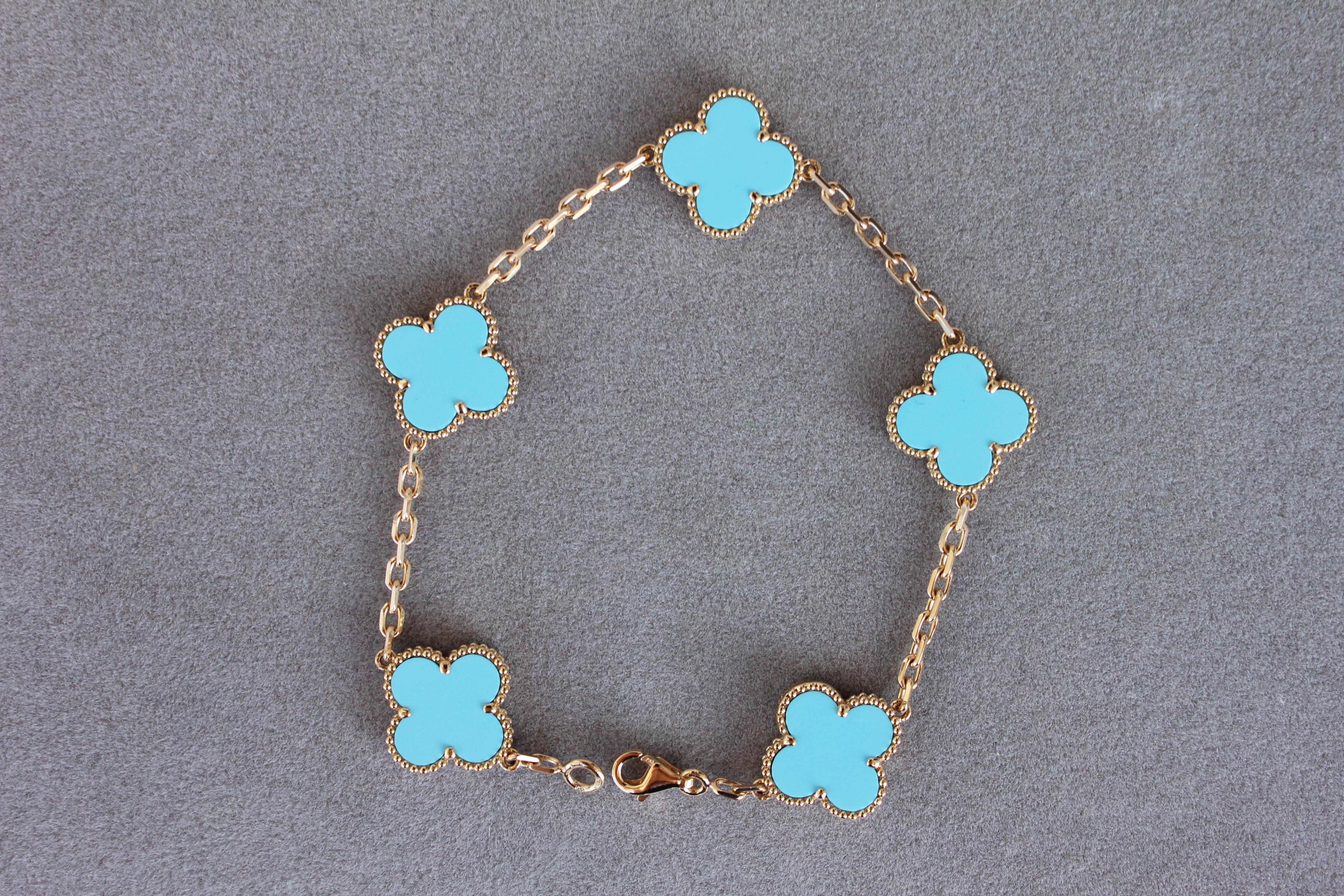 18K Yellow Gold AU 750 
Baby Light Blue Turquoise Motifs. Very gorgeous Turquoise with beautiful hues, colors, polish and shine. Please review all photos and video to see how it looks. 
10.28 Grams Weight
Excellent Quality - No visible