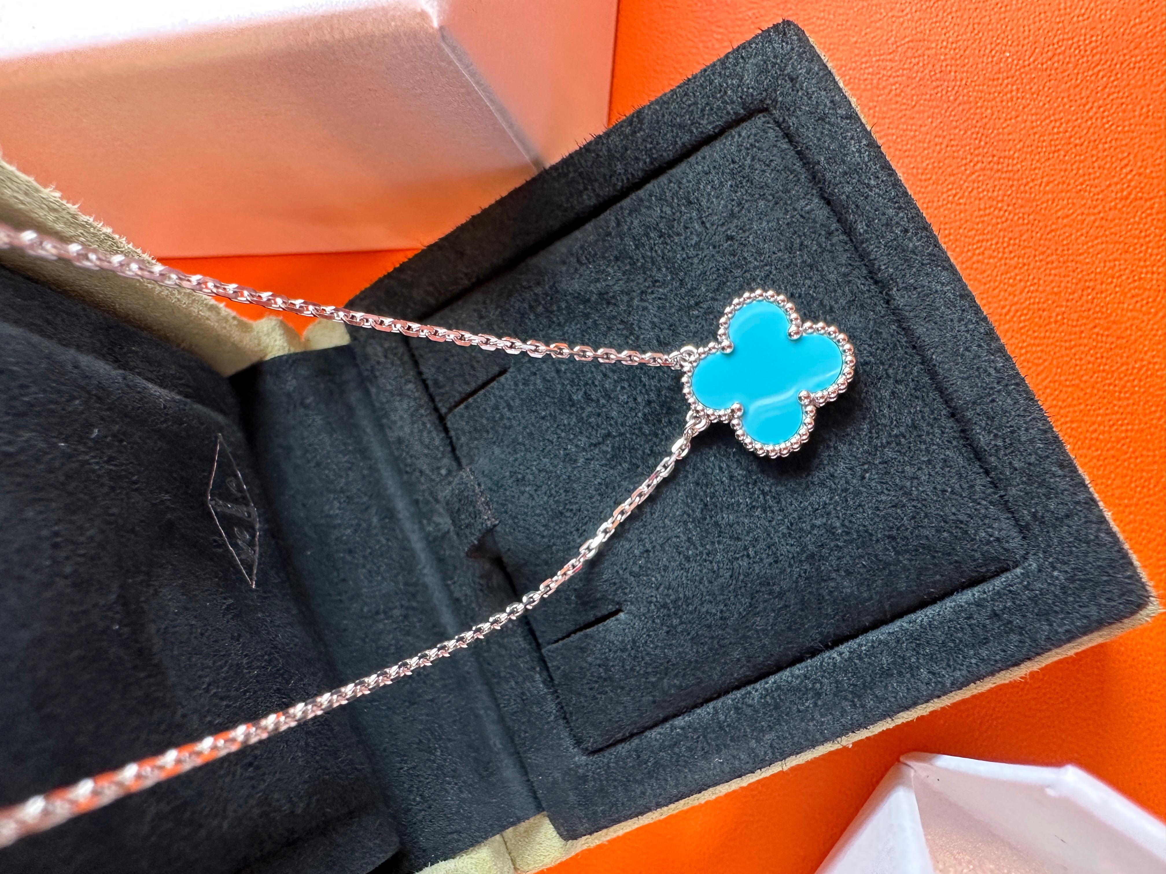 Super RARE Turquoise Vintage Alhambra Pendant Necklace.
No significant signs of wear. Turquoise is in immaculate shiny like-new condition.
No damage/discoloration. 
Comes with boxes and the necklace only.
Dated 2012.5.14 at VCA Singapore
