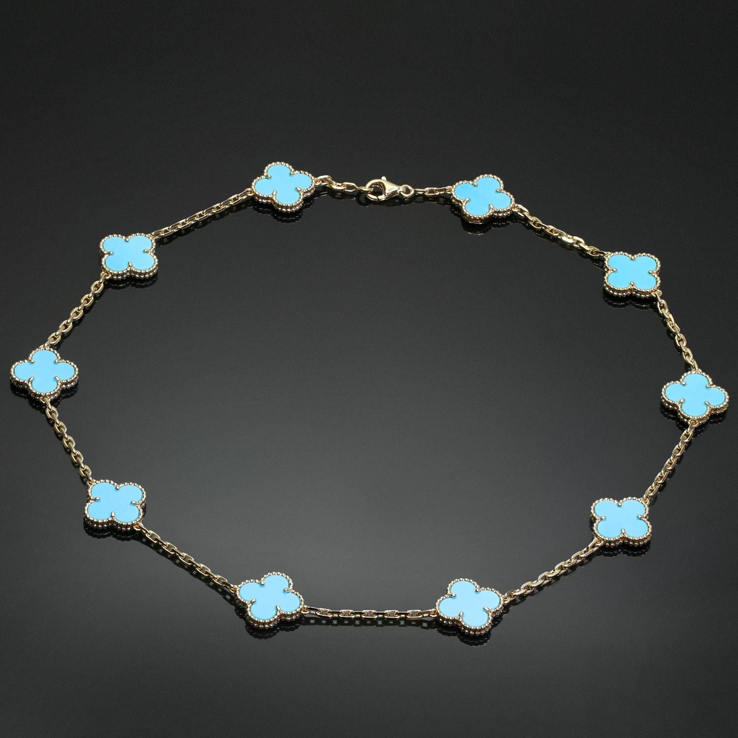 This classic Van Cleef & Arpels necklace from the iconic Vintage Alhambra collection is crafted in 18k yellow gold and features 10 lucky clover motifs inlaid with blue turquoise in round bead settings. Made in France circa 2010s. Measurements: 0.59