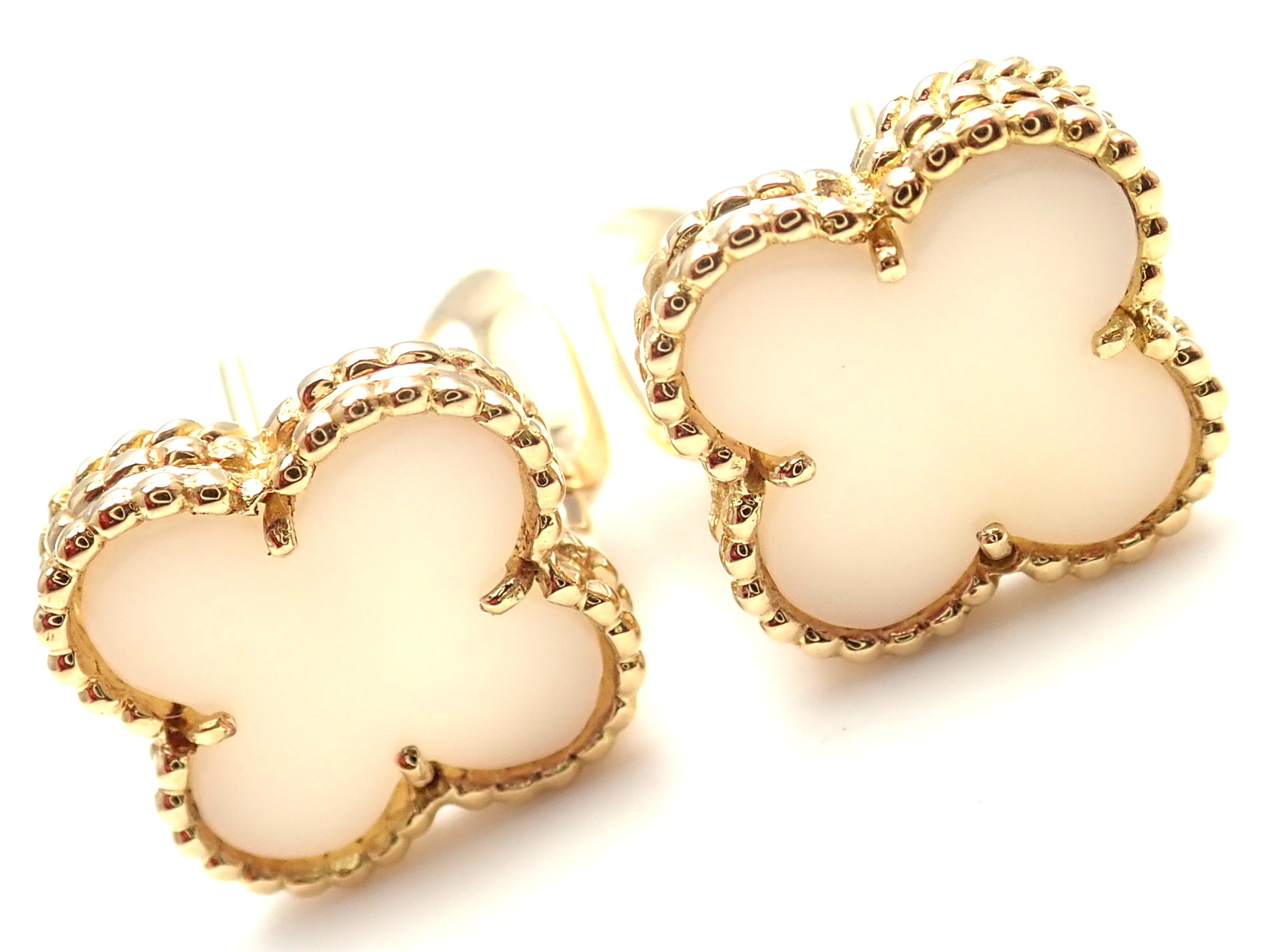 18k Yellow Gold Vintage Alhambra White Coral Earrings by Van Cleef & Arpels.  
With 2 alhambra shape white coral stones: 15mm each. 
These earrings are made for pierced ears.
These earrings come with service paper from VCA store in Japan.
Details: 