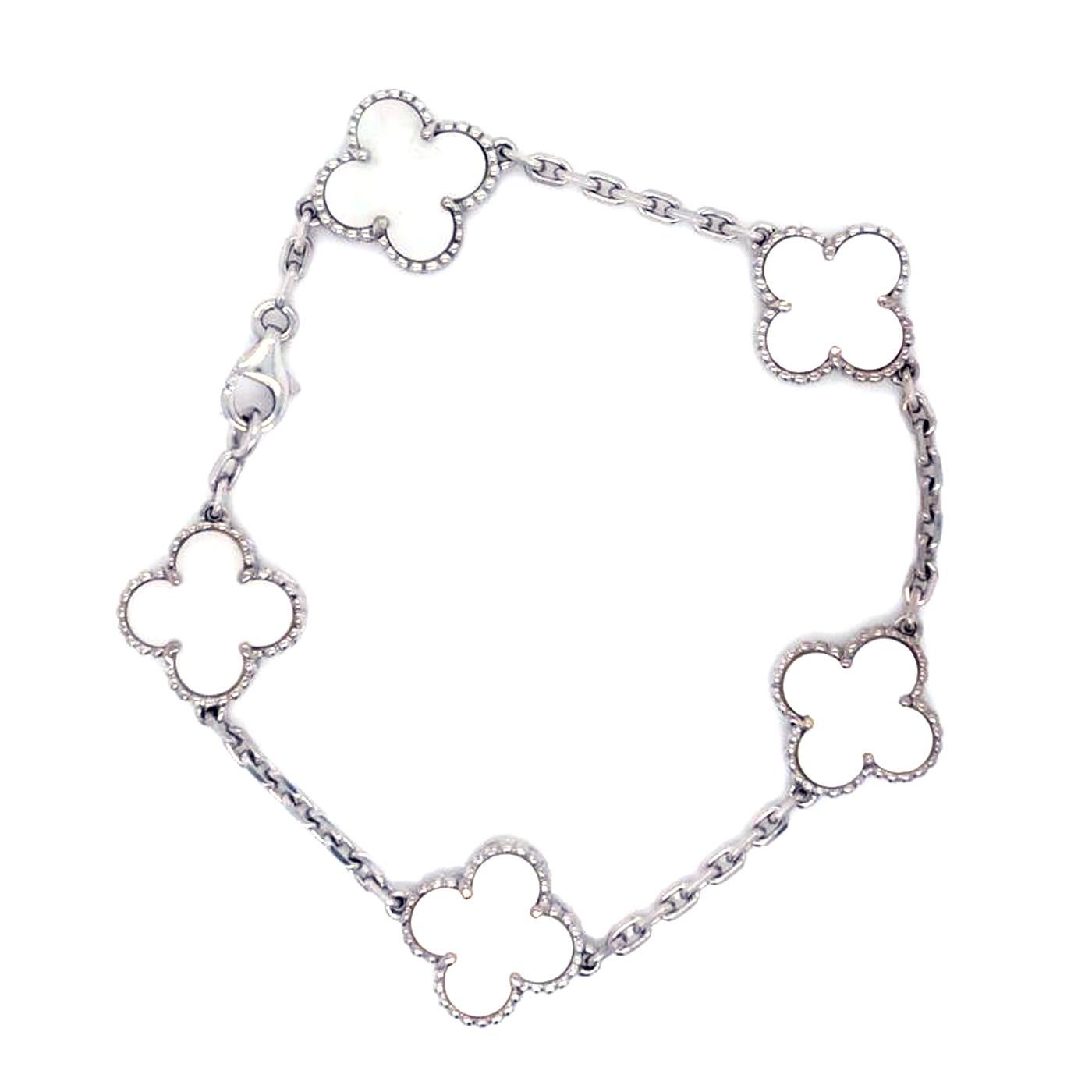 Van Cleef & Arpels Vintage Alhambra Bracelet 5 Motifs White Gold Mother of Pearl

Faithful to the very first Alhambra jewel created in 1968, the Vintage Alhambra creations by Van Cleef & Arpels are distinguished by their unique, timeless elegance.