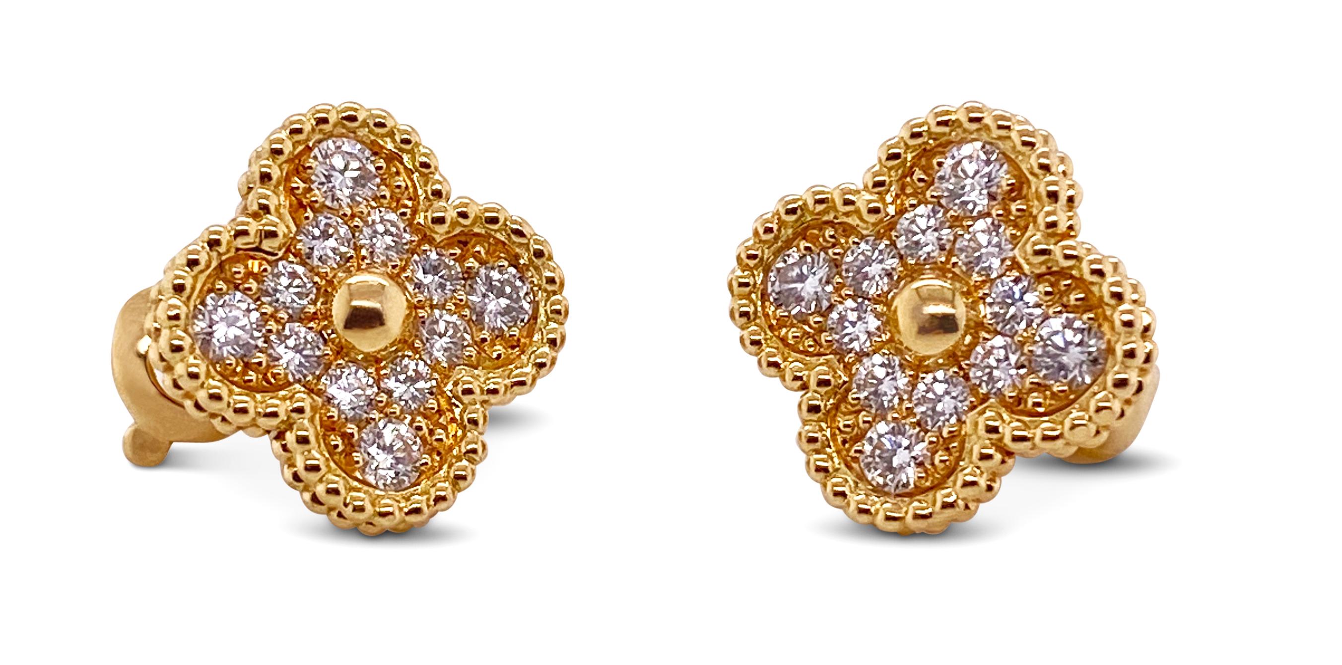 Authentic Van Cleef & Arpels Vintage Alhambra earrings crafted in 18 karat yellow gold and set with an estimated 0.88 carats of round brilliant cut diamonds (E-F color, VVS-VS clarity). Signed VCA, Au 750, with serial number. Earrings are not