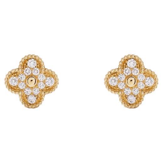 This classic vintage Van Cleef & Arpels earrings are  crafted in 18k yellow gold and feature 2lucky clover motifs inlaid withmalachite in round bead settings. Made in France circa 2000 Measurements: 0.59