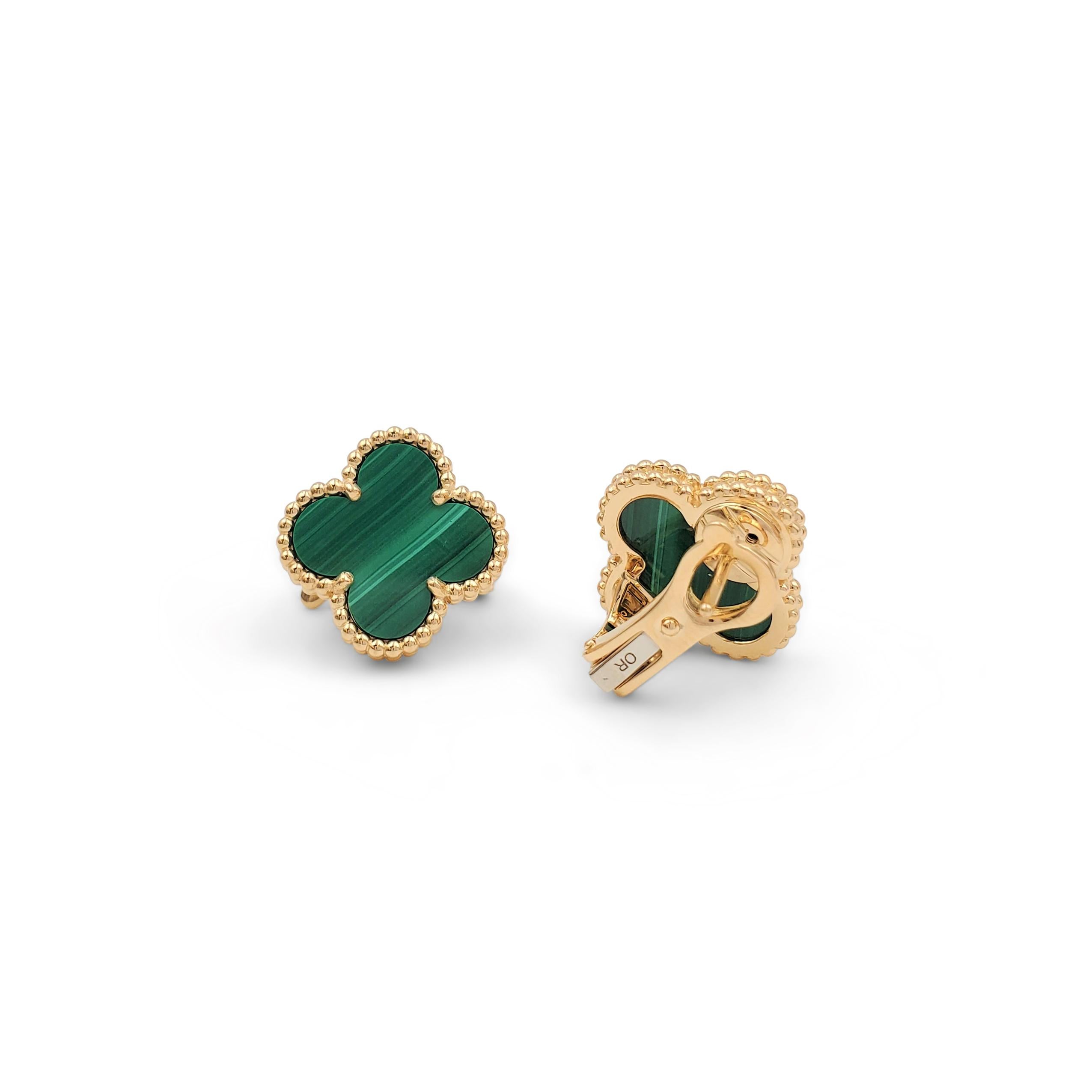Authentic Van Cleef & Arpels 'Vintage Alhambra' earrings crafted in 18 karat yellow gold featuring the cover leaf-inspired motif in malachite. Signed VCA, Au750, with serial number and hallmarks. The earrings are presented with the original box and