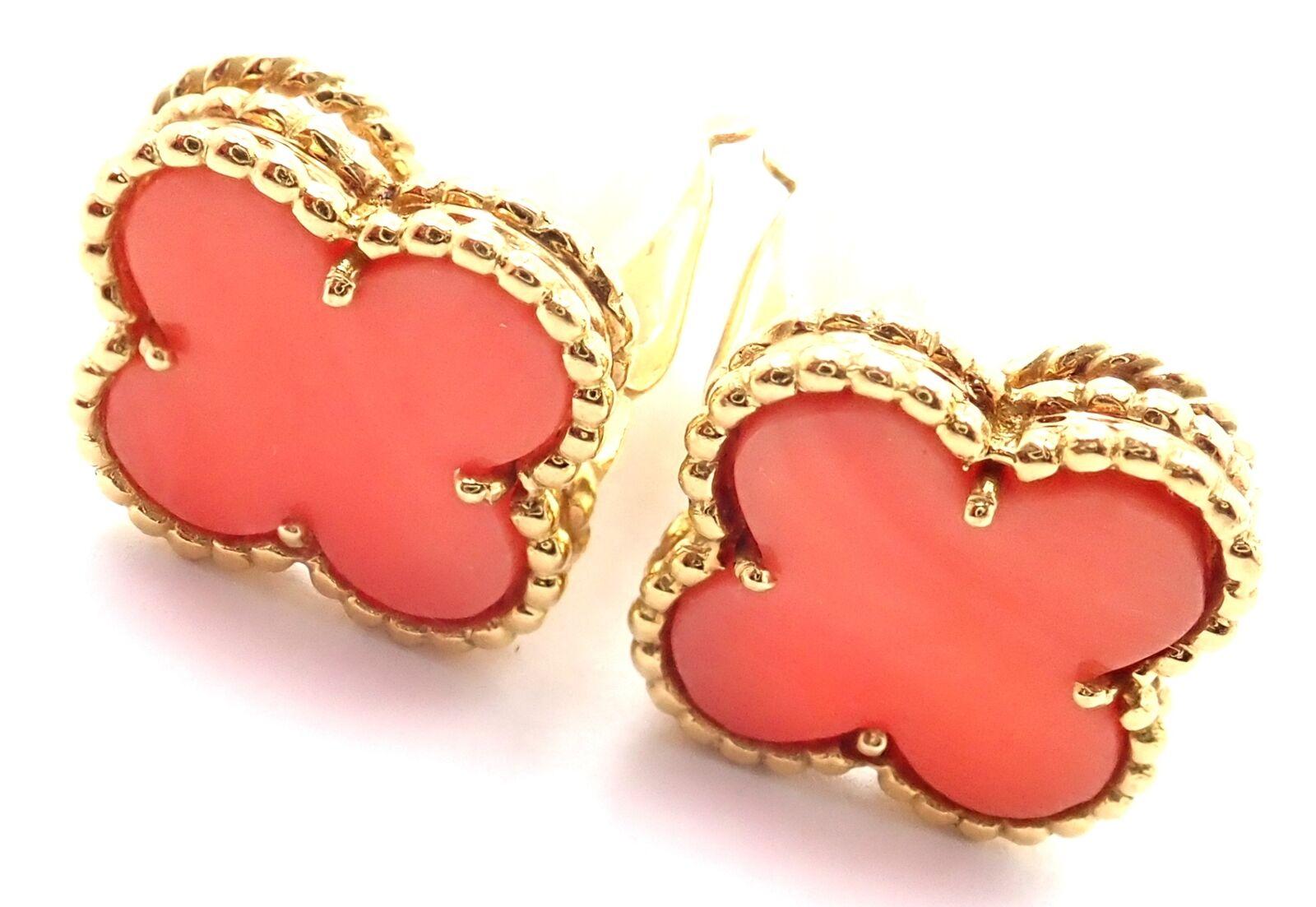 18k Yellow Gold Vintage Alhambra Coral Earrings by Van Cleef & Arpels.  
With 2 alhambra shape coral stones: 15mm each. 
These earrings are not pierced ears, but they can be converted to pierced ears by adding posts.
Details:  
Measurements: 15mm x