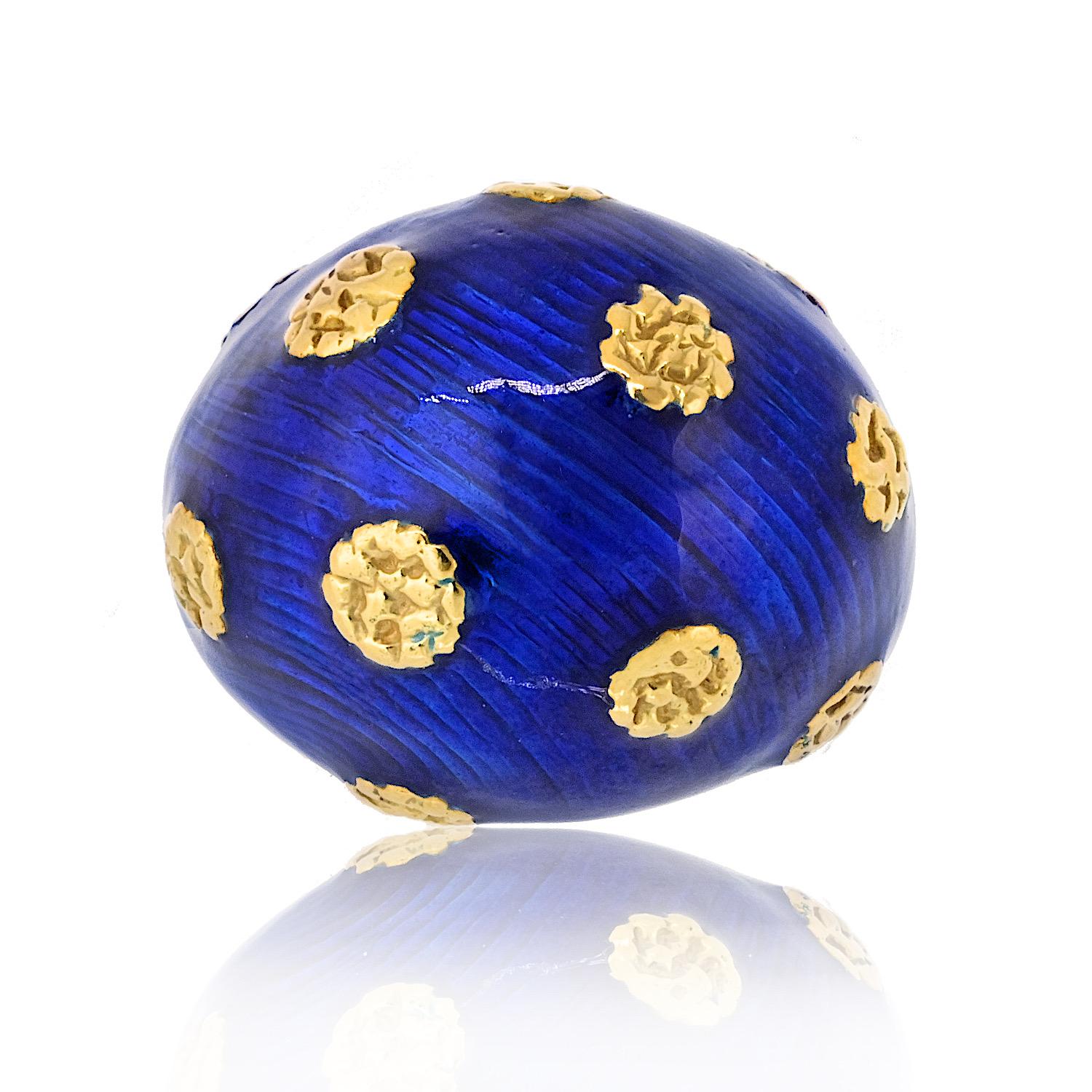 Vintage Van Cleef & Arpels earrings and ring set from the 1970s, a rare and timeless treasure. Crafted in 18K yellow gold, both pieces are adorned with a rich blue enamel overlay, creating a striking contrast against the warm gold. 

The vibrant