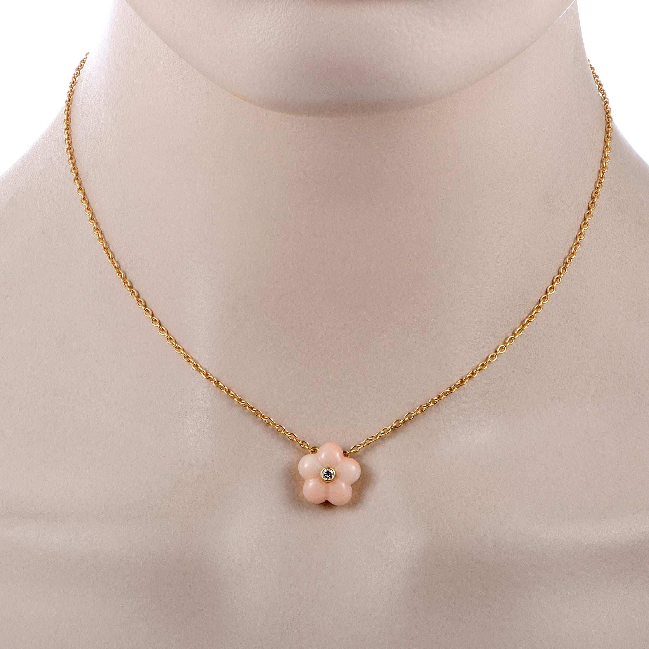 This Van Cleef & Arpels vintage necklace is made of 18K yellow gold and embellished with a diamond and a coral. Weighing 6.6 grams, the necklace is presented with a 15.00” chain featuring spring ring closure and a flower pendant that measures 0.50”