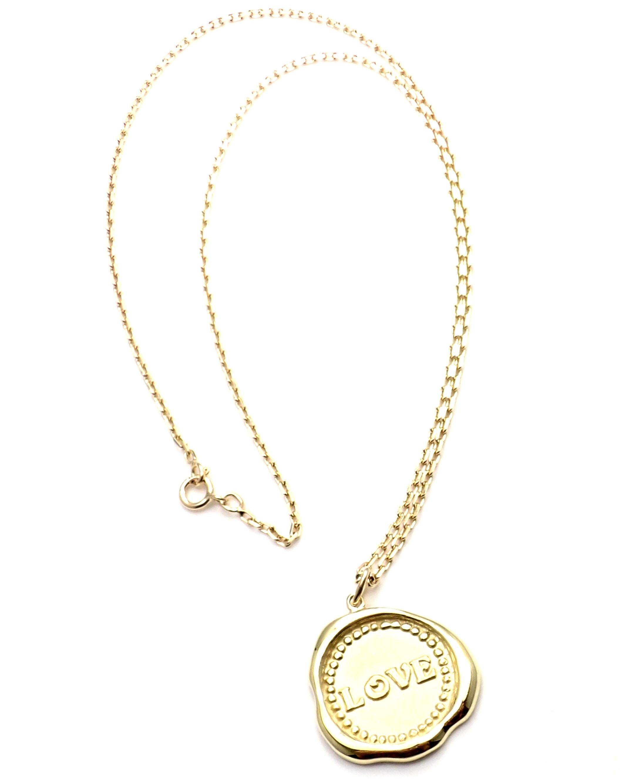 18k Yellow Gold Vintage Love Pendant Necklace by Van Cleef & Arpels. 
This necklace comes with Van Cleef & Arpels service paper.
Details: 
Length: 20