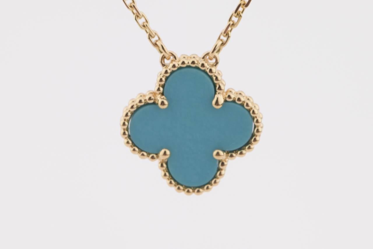 Van Cleef & Arpels turquoise Alhambra is a very rare piece, especially this medium size of the turquoise Alhambra which you won't find it comes to the market very often because VCA has already stopped producing turquoise medium size anymore. This is