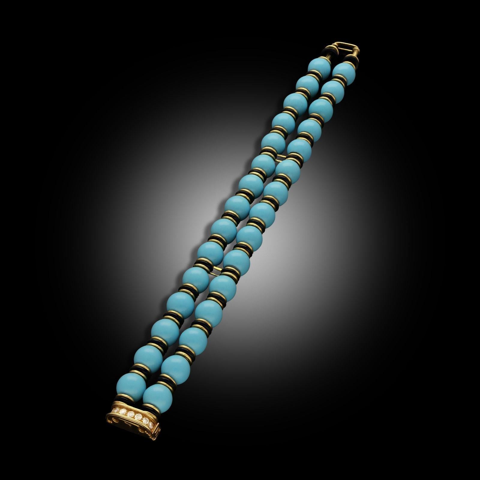 A vintage turquoise, onyx & yellow gold bracelet by Van Cleef & Arpels, circa 1965. This bracelet is designed as a double row of turquoise beads with polished black onyx rondelles and 18ct yellow gold spacers, all threaded on an articulated 18ct