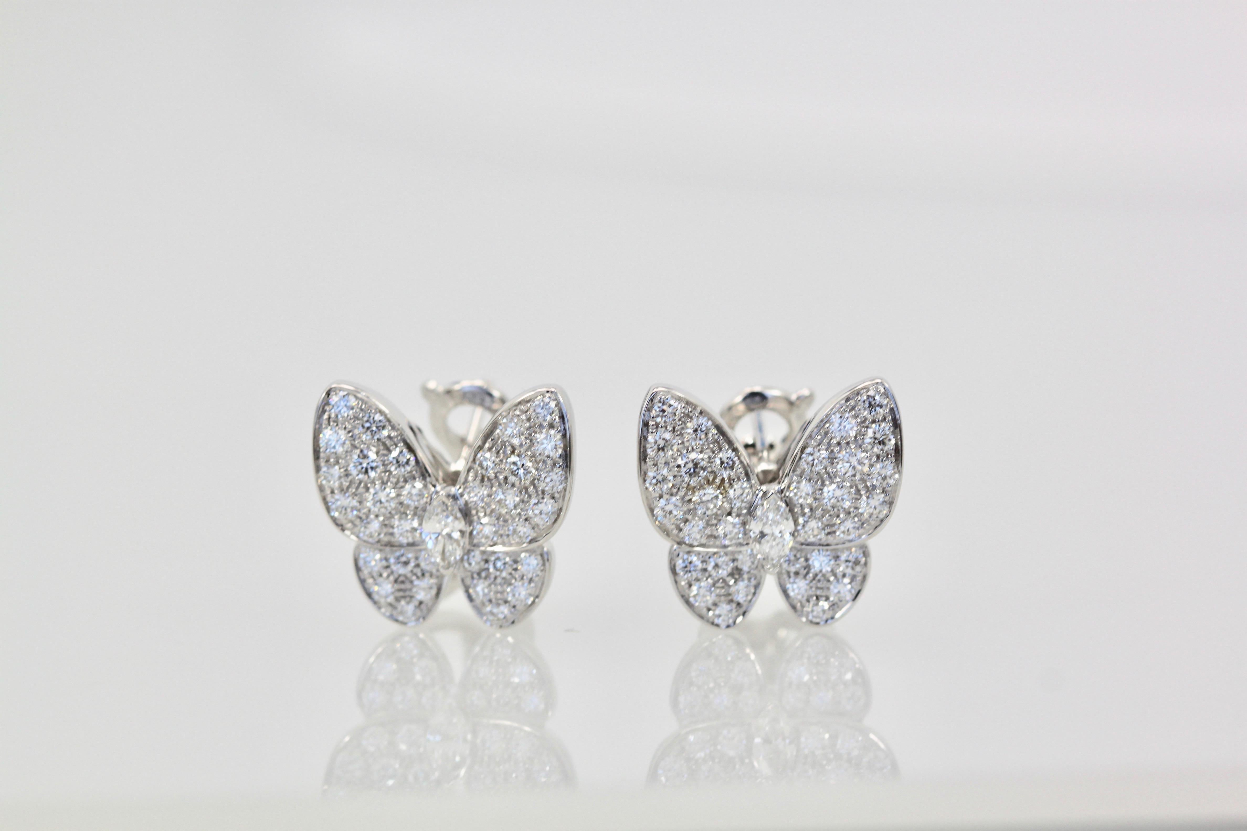 These gorgeous VCA white diamond butterfly earrings are made in 18K white gold and feature 70 Diamonds all clarity IF-VVS, color D,E,F  and weighs in at 1.67 carats and retails for $25,800.  Comes with box and certificate