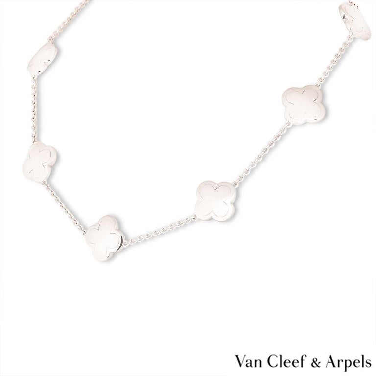 A stunning 18k white gold necklace from the Alhambra collection by Van Cleef & Arpels. The necklace is made up of 9 four leaf clover motifs with a polished white gold boarder and centre. The necklace measures 16 inches in length and has a concealed