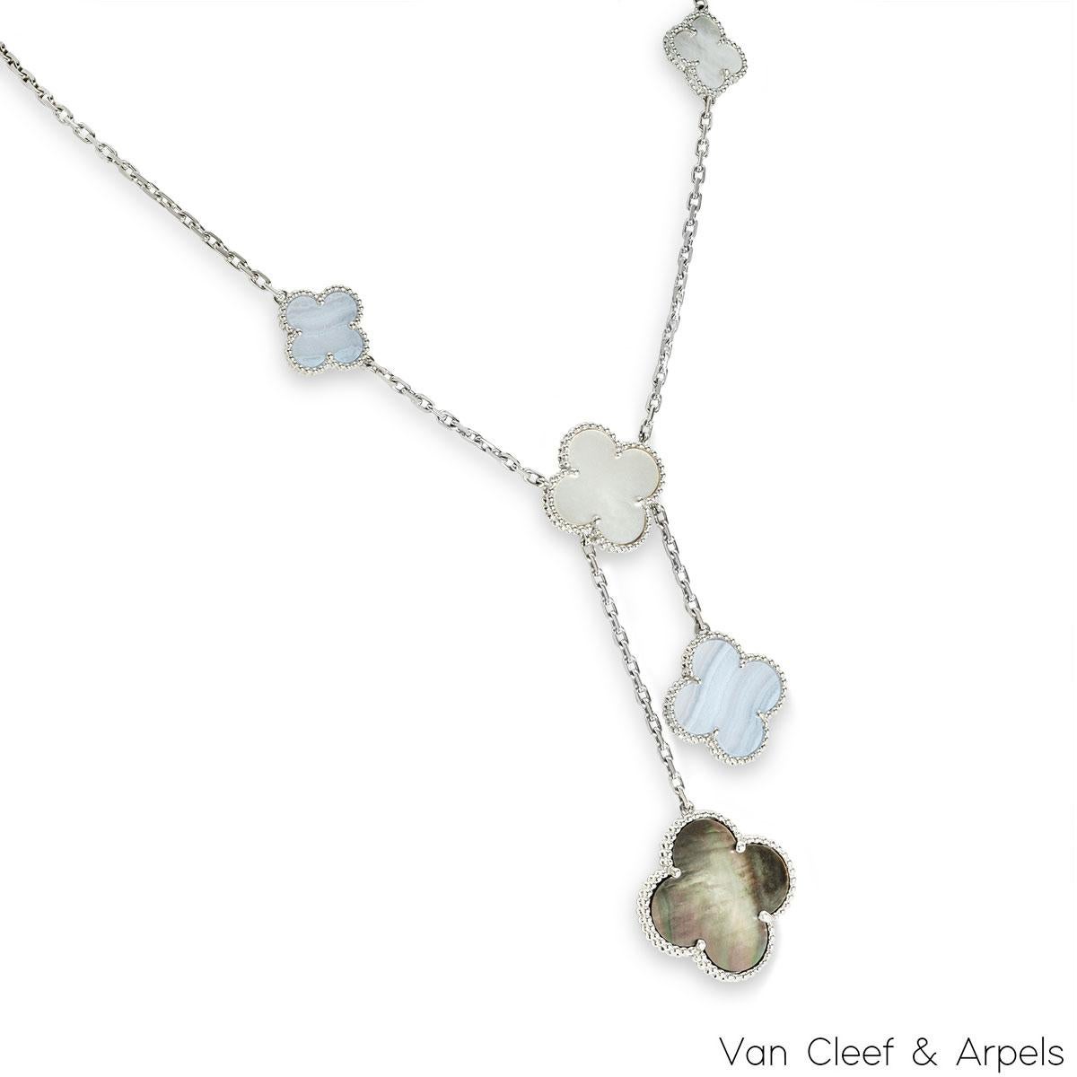 A luxurious 18k white gold necklace by Van Cleef & Arpels from the Magic Alhambra collection VCARN18900. The necklace features 6 four leaf clover motifs alternating in size, set with chalcedony, grey and white mother of pearl inlays complemented by