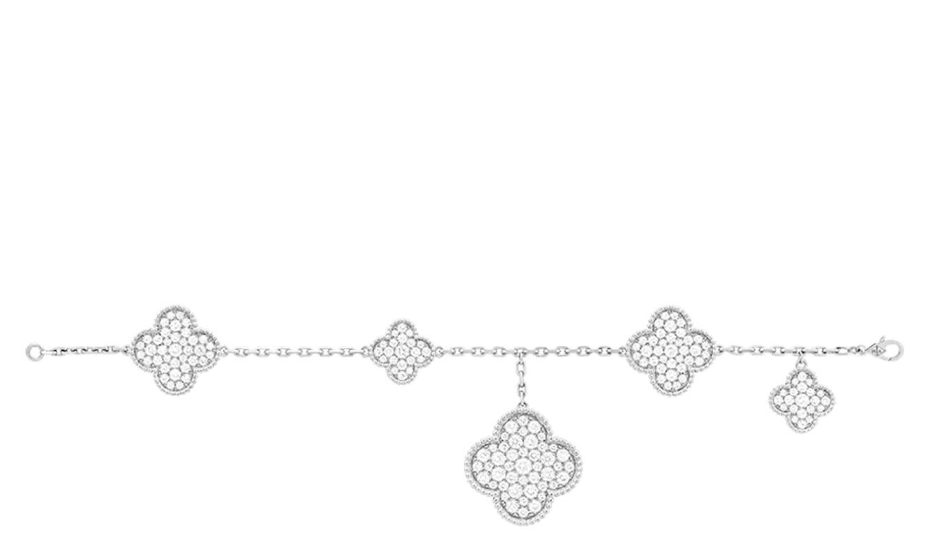 Description
Created in 2006 by Van Cleef & Arpels, the Magic Alhambra(R) jewelry creations gather different-sized Alhambra motifs, coming together in a joyful dance. Inspired by the clover leaf, their asymmetric designs feature different