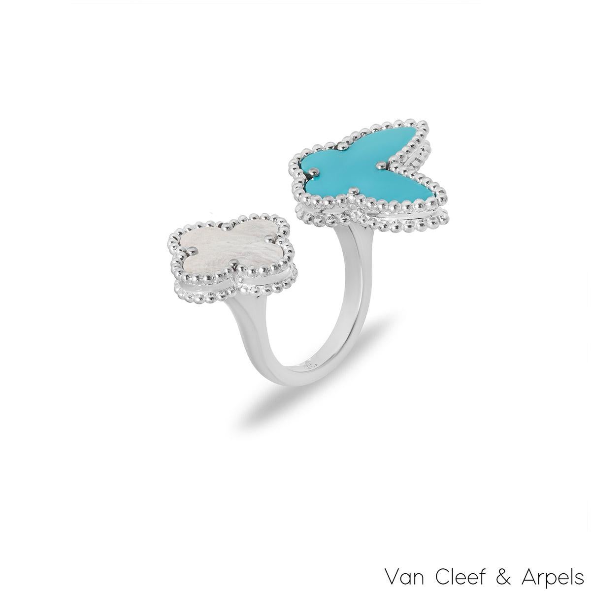 A coveted 18k white gold Van Cleef & Arpels ring from the Lucky Alhambra collection. The ring features a butterfly motif set with a turquoise inlay and a clover motif set with a mother of pearl inlay, both with a beaded outer edge. The 2.6mm wide