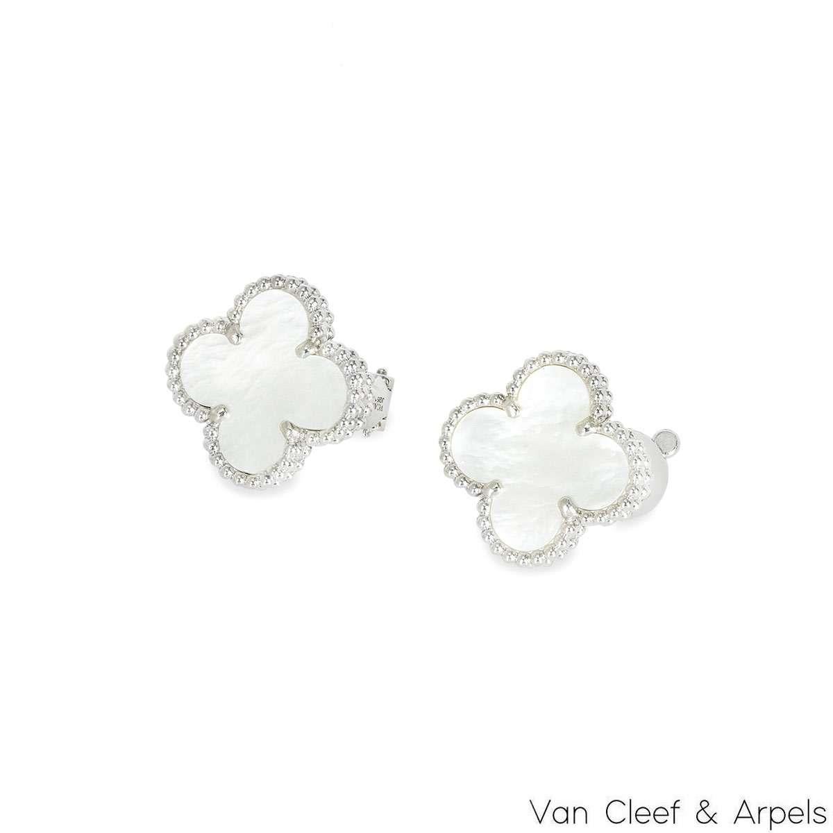 An elegant pair of 18k white gold mother of pearl Van Cleef & Arpels earrings from the Vintage Alhambra collection. The earrings feature the iconic 4-leaf clover motif, with a mother of pearl inlay set to the centre, complemented by a beaded edge.