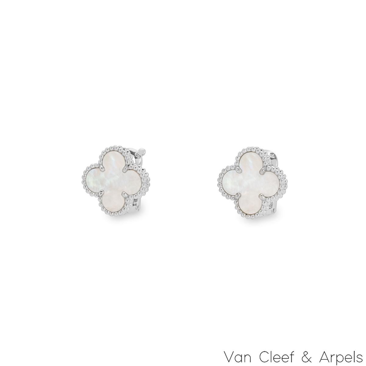 An elegant pair of 18k white gold mother of pearl Van Cleef & Arpels earrings from the Vintage Alhambra collection (VCARP48600). The earrings feature the iconic 4-leaf clover motif, with a mother of pearl inlay set to the centre, complemented by a