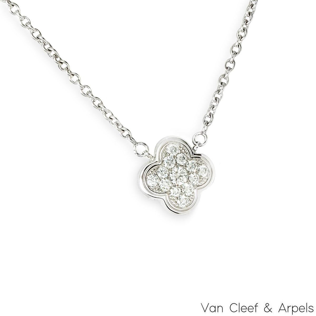 A timeless 18k white gold pendant by Van Cleef & Arpels from the Pure Alhambra collection. The pendant features a 4-leaf clover motif set with 13 round brilliant cut diamonds with a total weight of approximately 0.33ct, D-F colour and IF-VVS