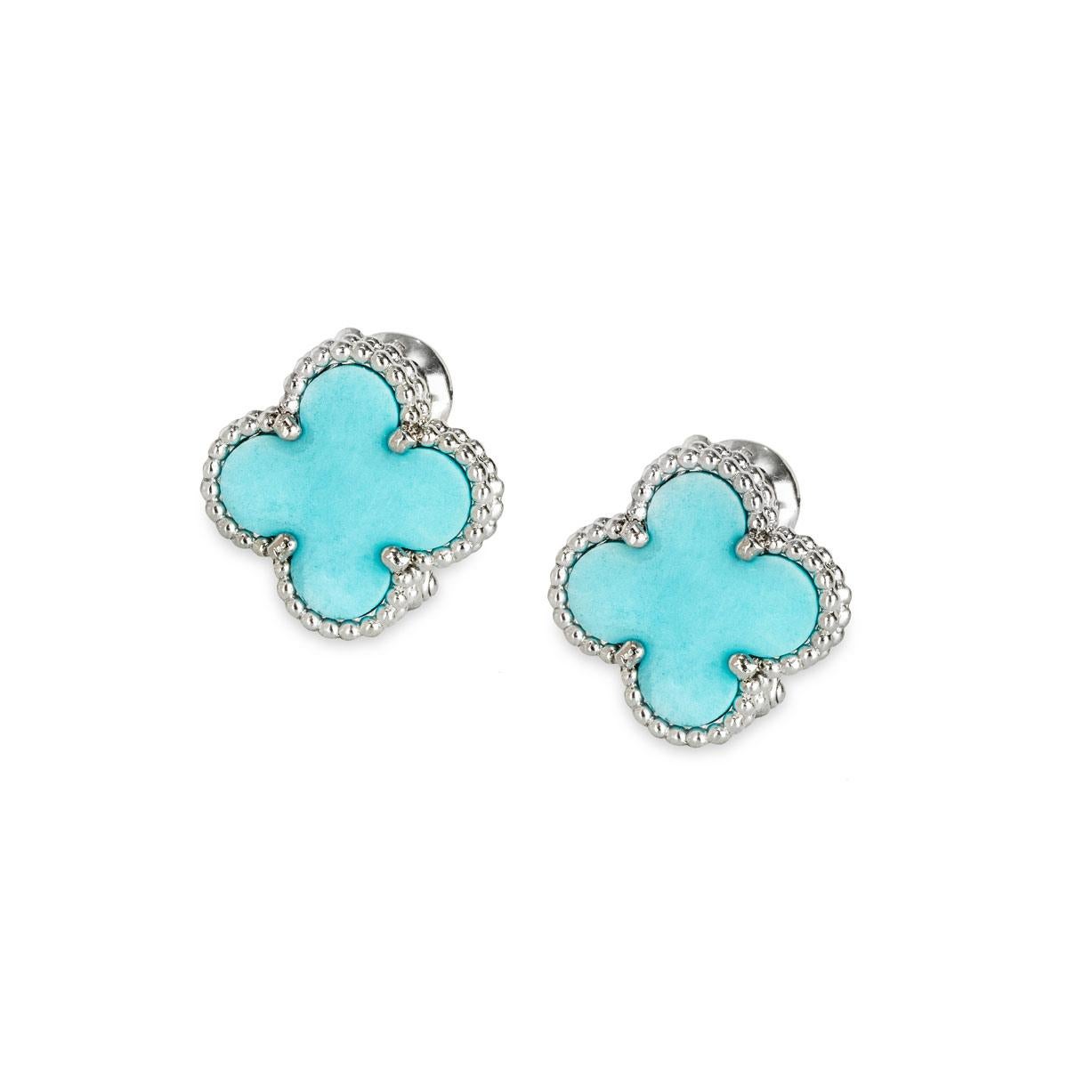 A beautiful pair of 18k white gold turquoise Van Cleef & Arpels earrings from the Vintage Alhambra collection. The earrings feature the iconic 4-leaf clover motif, with a rare turquoise inlay set to the centre, complemented by a beaded edge. The