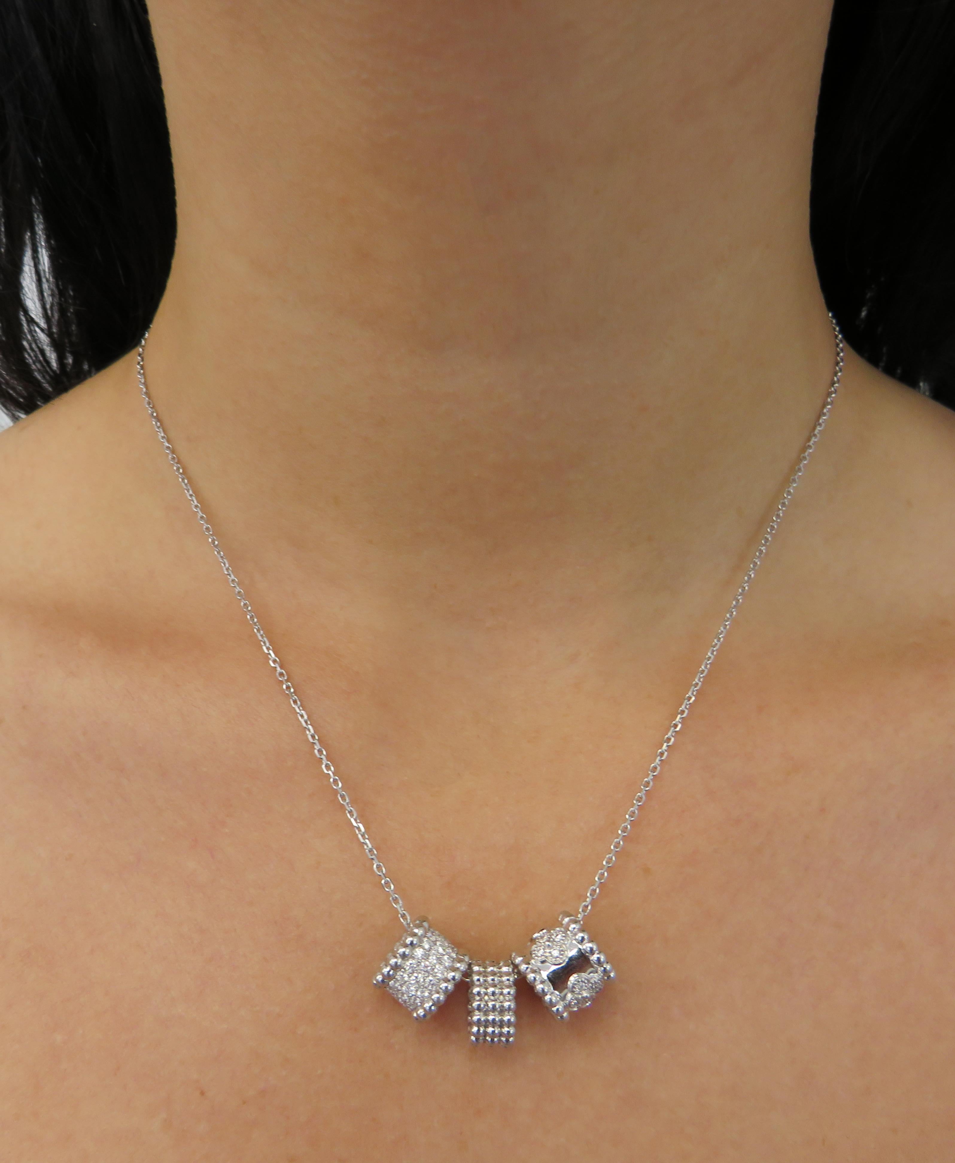Magnificent Van Cleef & Arpels white gold trace chain necklace with 3 Perlée Pendants, crafted in 18 karat white gold, featuring 67 round brilliant cut diamonds weighing approximately 1.39 carats total, D-F color, IF-VVS clarity. The trace chain