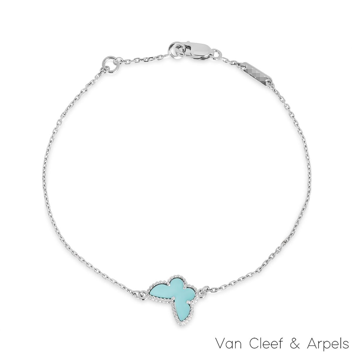 A lovely 18k white gold bracelet from the Sweet Alhambra collection by Van Cleef & Arpels. The Butterfly motif has a turquoise inlay displayed on both sides, complemented by a beaded outer edge. The butterfly motif measures 1.8cm in height and 2.1cm