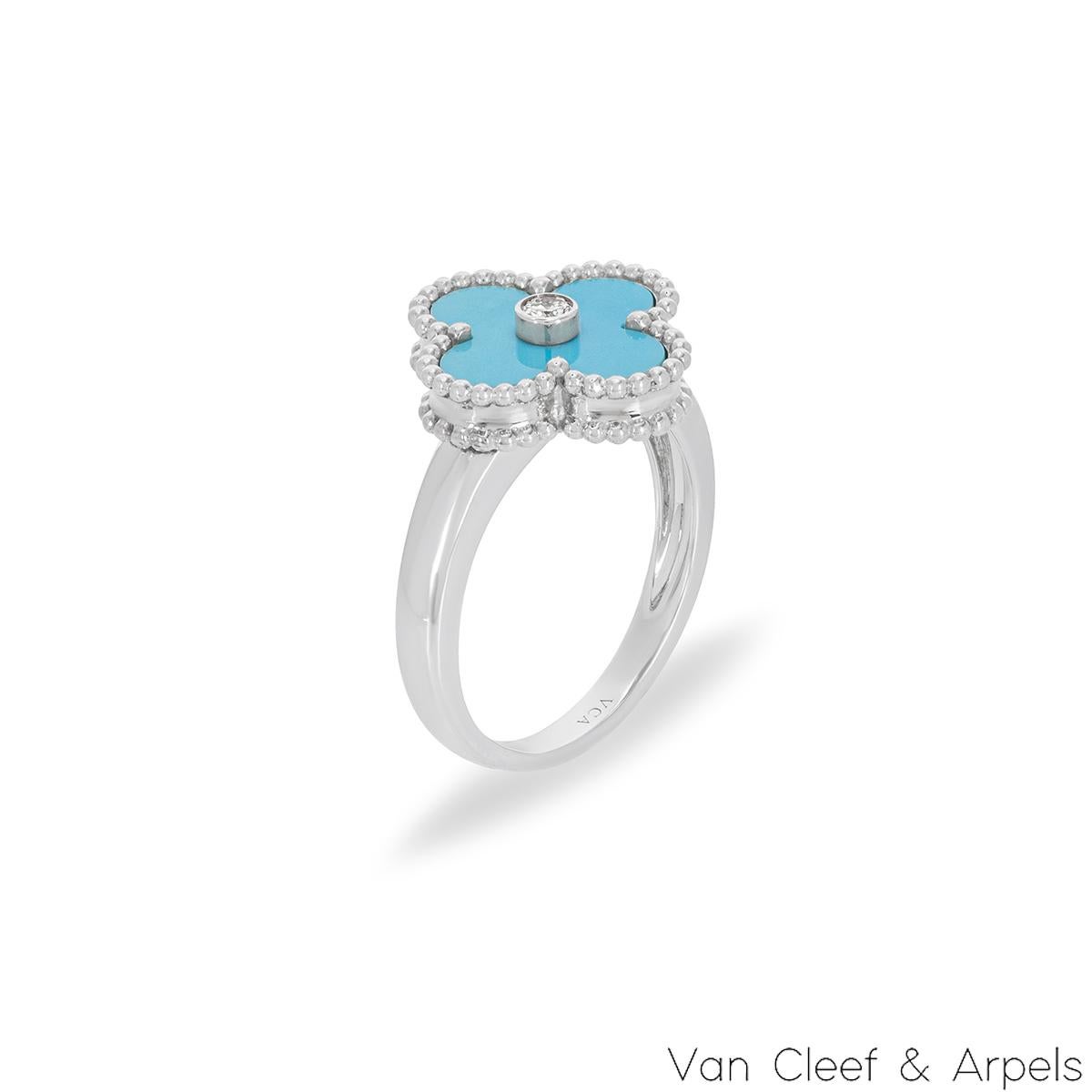 A rare 18k white gold turquoise ring by Van Cleef & Arpels from the Vintage Alhambra collection. The ring features the iconic 4-leaf clover motif with a turquoise inlay, complemented by a beaded edge and a round brilliant cut diamond set to the