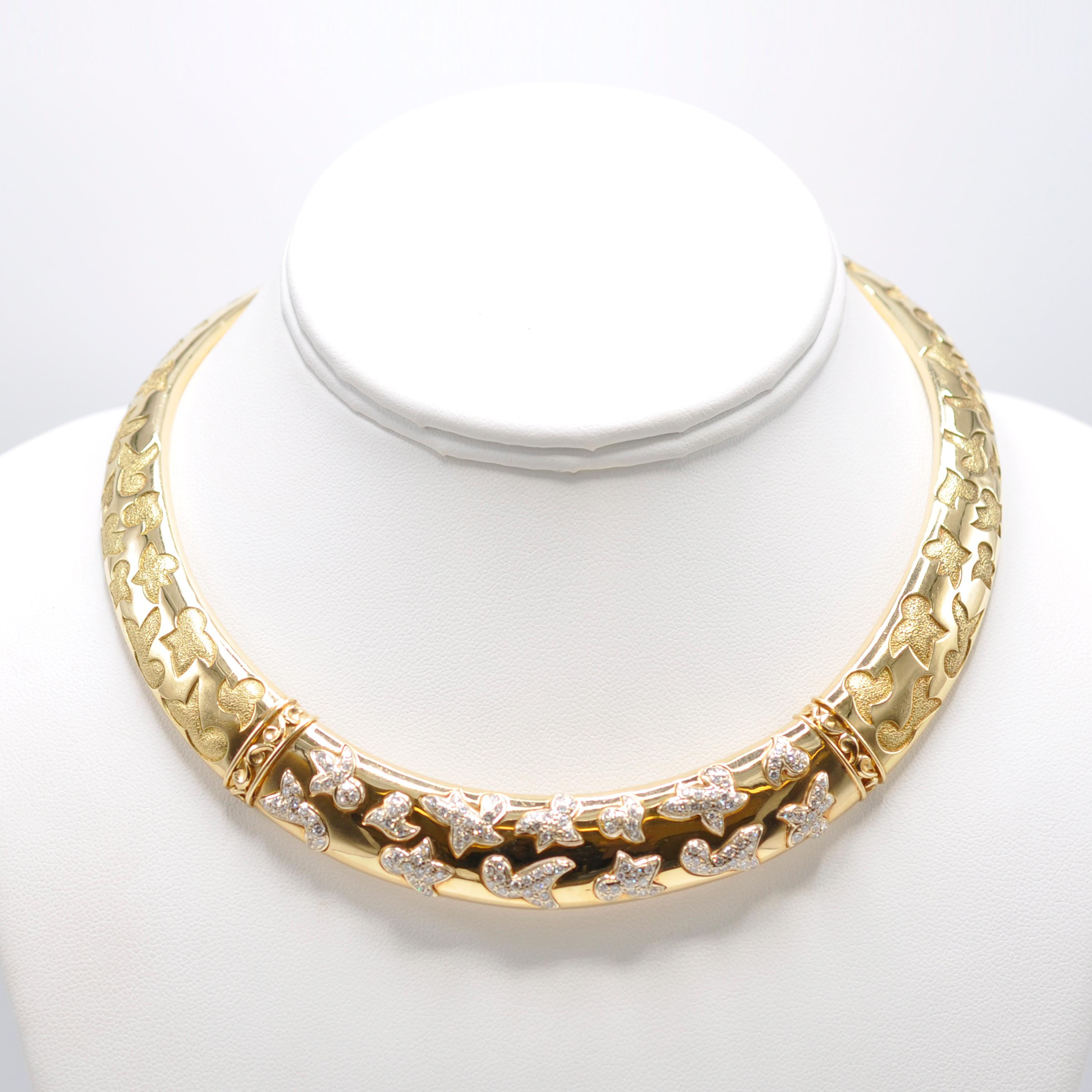 Bold and Beautiful our Van Cleef & Arpels 18 Karat yellow gold and 3.2 cts. diamond dove motif collar necklace is a dream for any woman to wear. The necklace lays effortlessly on your collar creating an inspiring centerpiece for a simple but elegant