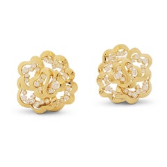 Van Cleef & Arpels Boucles d'oreilles fleur en or jaune et diamants ajourés