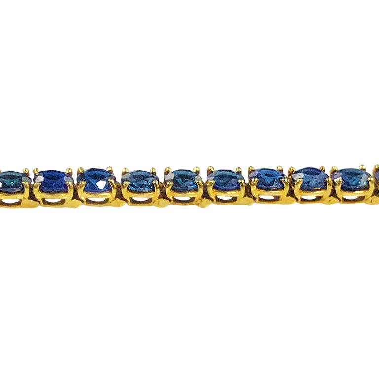 Van Cleef and Arpels Yellow Gold and Sapphire Tennis Line Bracelet at