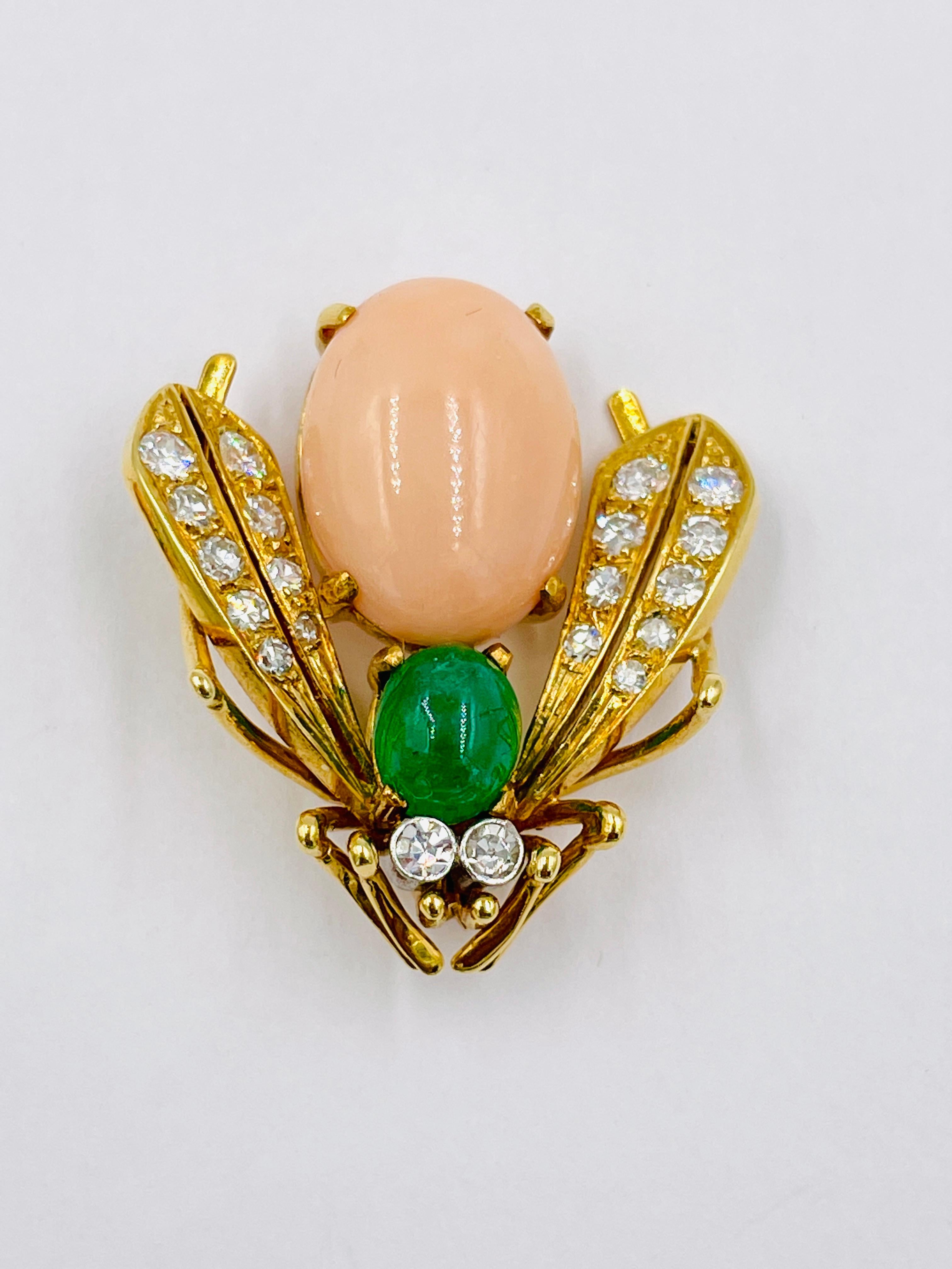 Van Cleef & Arpels pair of bee brooches, circa 1970s.  These pins are quite rare.
Set with Coral, Emerald, and Diamonds set in 18k yellow gold.

Dimension: #1.   1-1/8