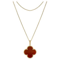 Van Cleef & Arpels Collier long Magic Alhambra en or jaune et cornaline VCARO49N00