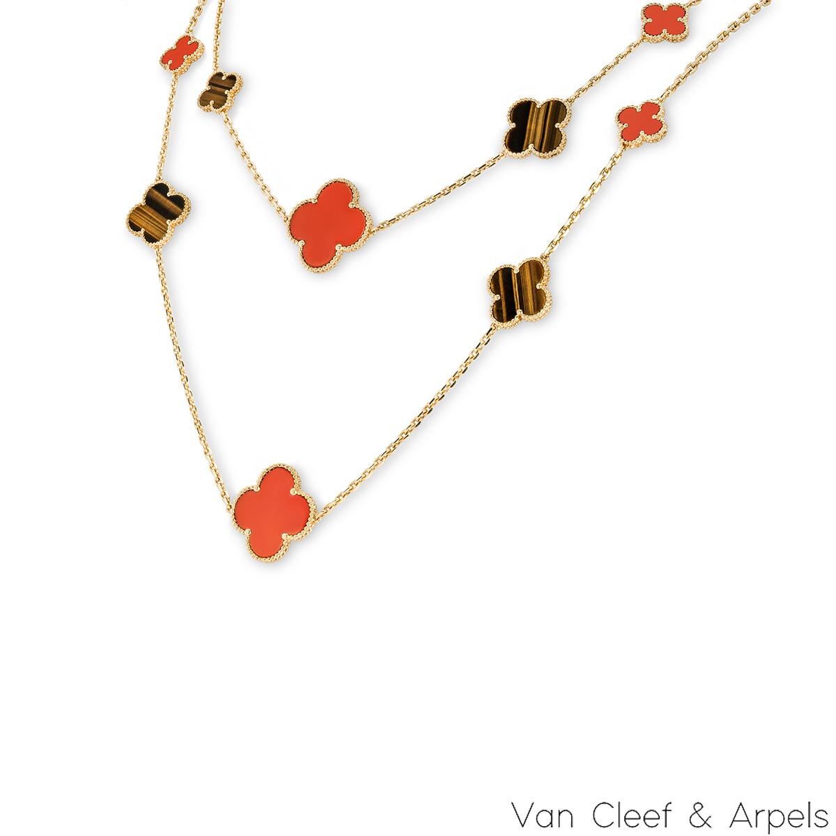 An exquisite 18k yellow gold Van Cleef & Arpels necklace from the Magic Alhambra collection. The necklace comprises of 16 iconic 4 leaf clover motifs alternating in size, set with carnelian and tiger's eye inlays and complemented by a beaded outer