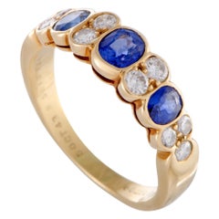 Van Cleef 
Arpels Yellow Gold Diamond and 3-Sapphire Band Ring