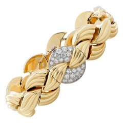 Van Cleef & Arpels Orologio da polso con quadrante nascosto e diamanti in oro giallo