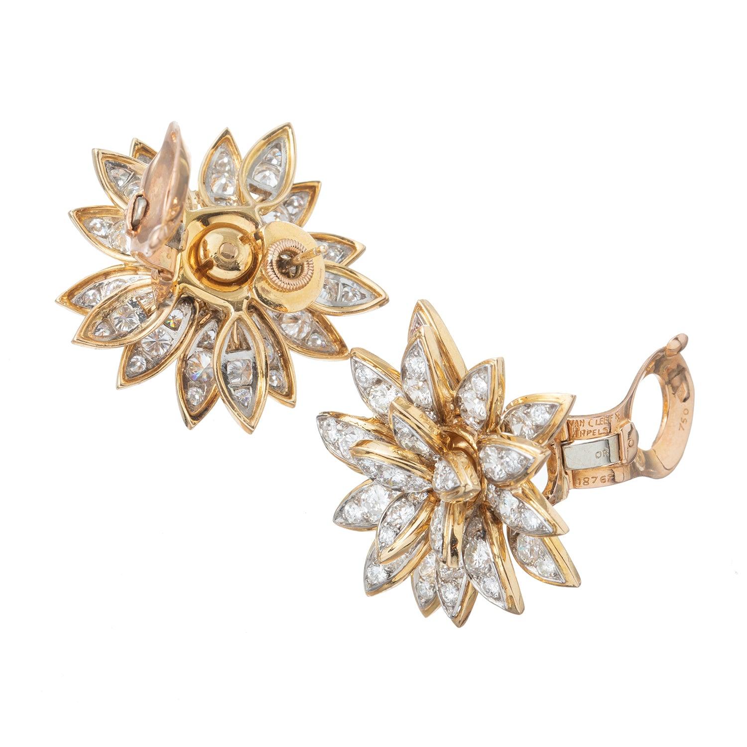 Experience the timeless elegance and exquisite craftsmanship of Van Cleef & Arpels with these diamond Lotus Flower earrings from the 1950s.  The magnificent earrings, crafted in 18k yellow gold, feature a stunning arrangement of 120 fine colorless