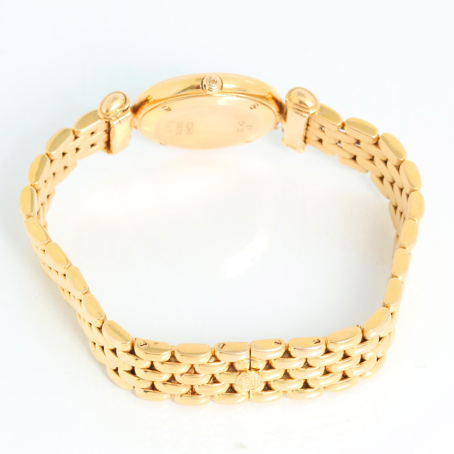 Van Cleef & Arpels Yellow Gold Ladies Watch Ref. 12264305GG1 - Quartz. 18K Yellow Gold ( 24 mm ). White dial with black hour markers and Roman numerals. 18K Yellow gold Van Cleef & Arpels bracelet with deployant clasp; will fit a 6.5 inch wrist .