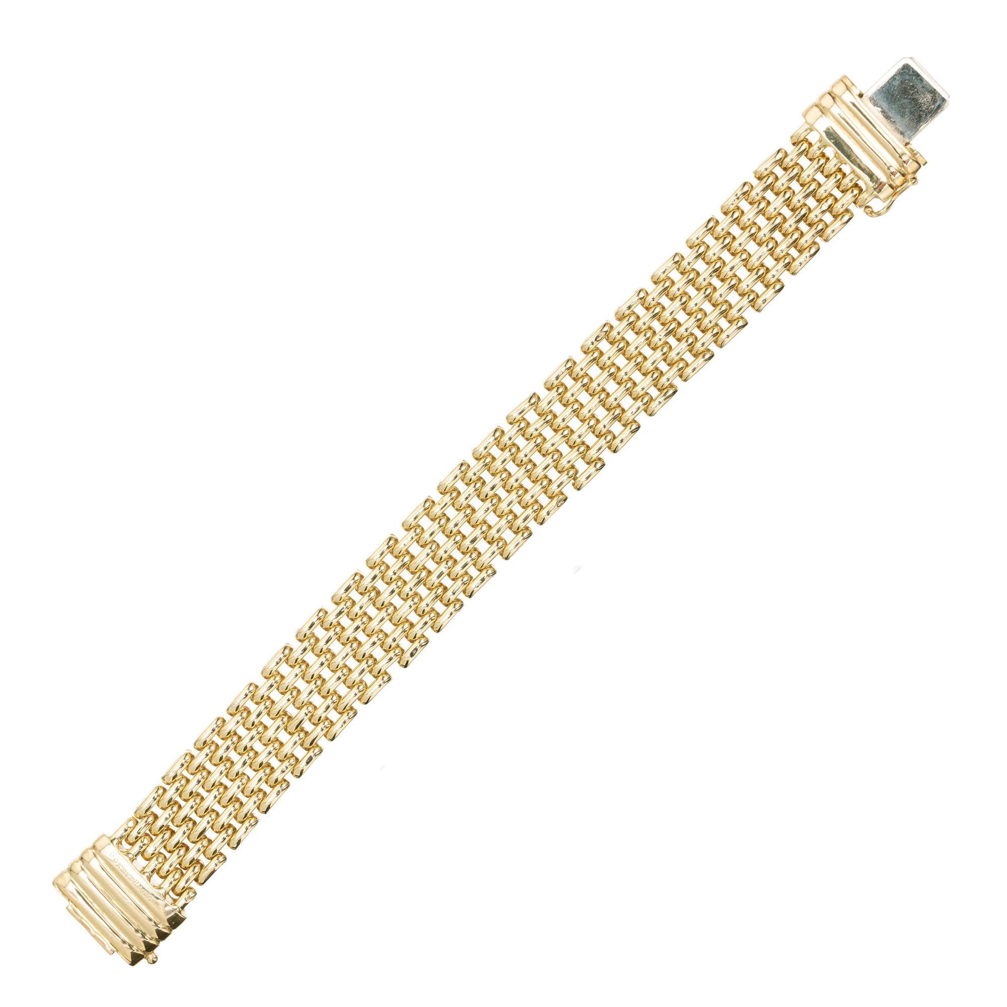 18k Gelbgold Van Cleef & Arpels Gliederarmband Glieder bestehen aus 9 Reihen von ovalen Gliedern abwechselnd Reihen von fünf und vier über. 7.5 Zoll in der Länge. 

18k Gelbgold
Getestet: 18k
Gestempelt: 750
Kennzeichen: VCA NYZK461A-1
43::9